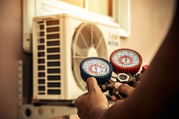 Professional Air Conditioning Service technician working in Ramseur, NC